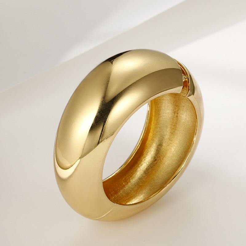 Extravagant Gold-Tone Asymmetric Bracelet with European Flair