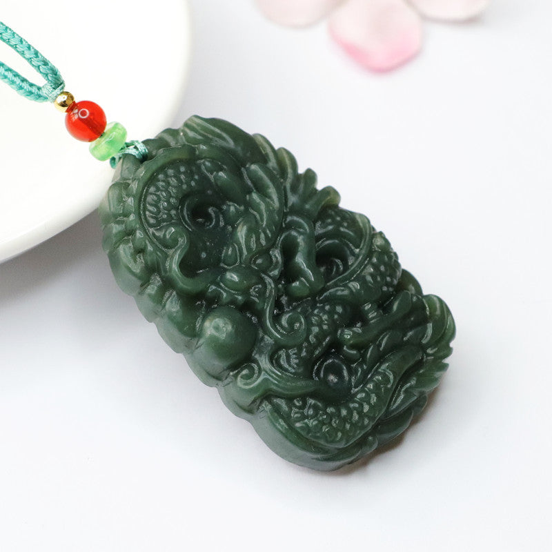Taqing Hetian Jade Flying Dragon Pendant
