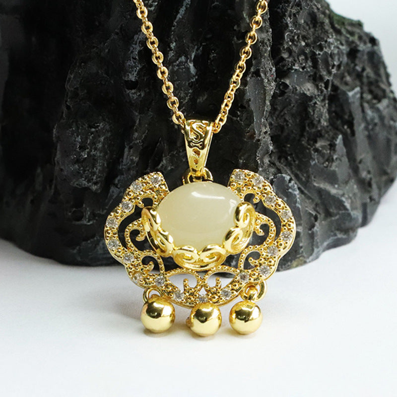 Zircon Ruyi Lock Pendant crafted from Hetian Jade and Sterling Silver