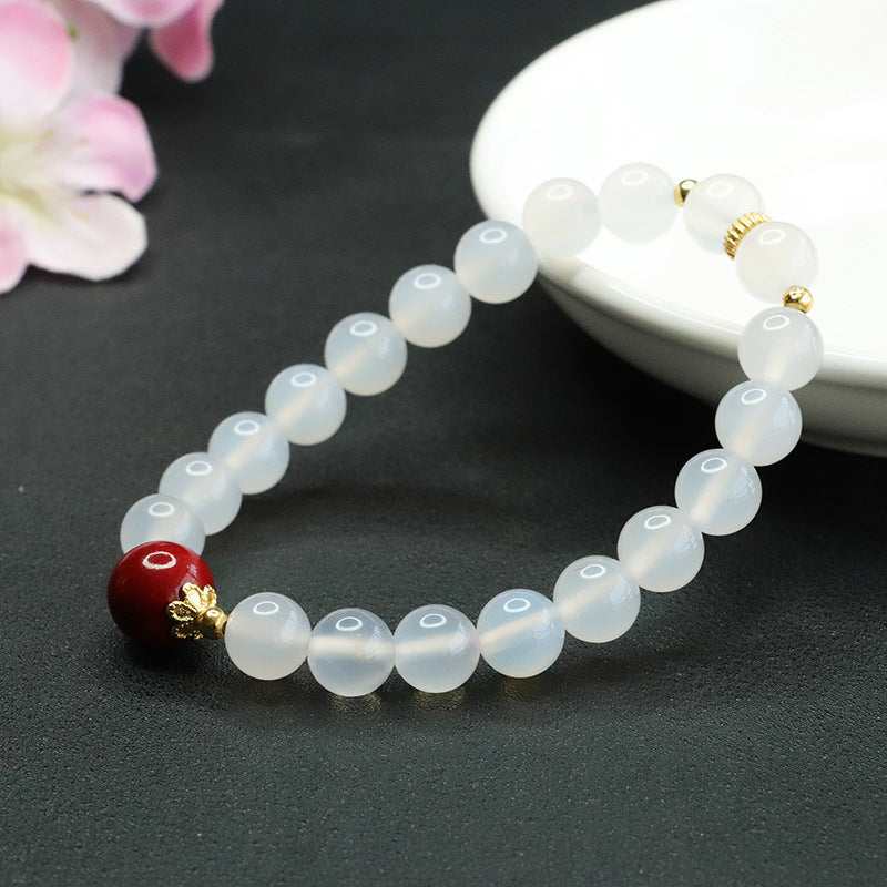 Fortune's Favor Sterling Silver Bracelet with Cinnabar Bead and Natural White Chalcedony