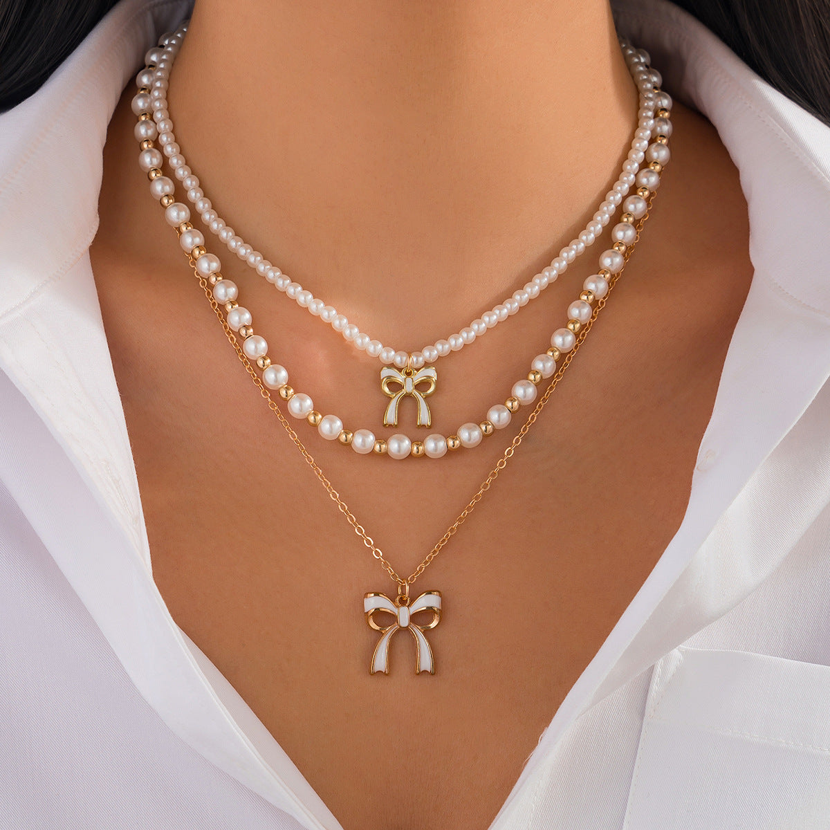 Layered Imitation Pearl Bow Tassel Necklace