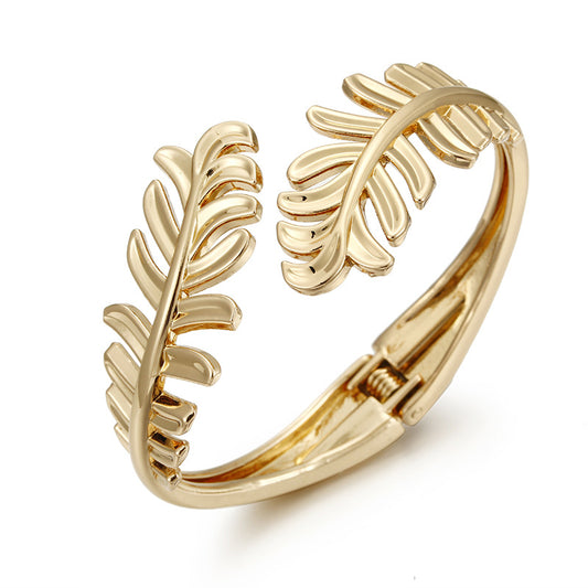 Leaf Design Gold Bracelet for Fashion-Forward Females - Vienna Verve Collection