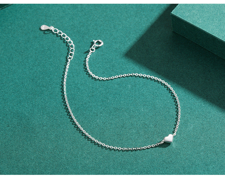 Sterling Silver Love Girl Bracelet - Elegant and Versatile Cross Chain Jewelry