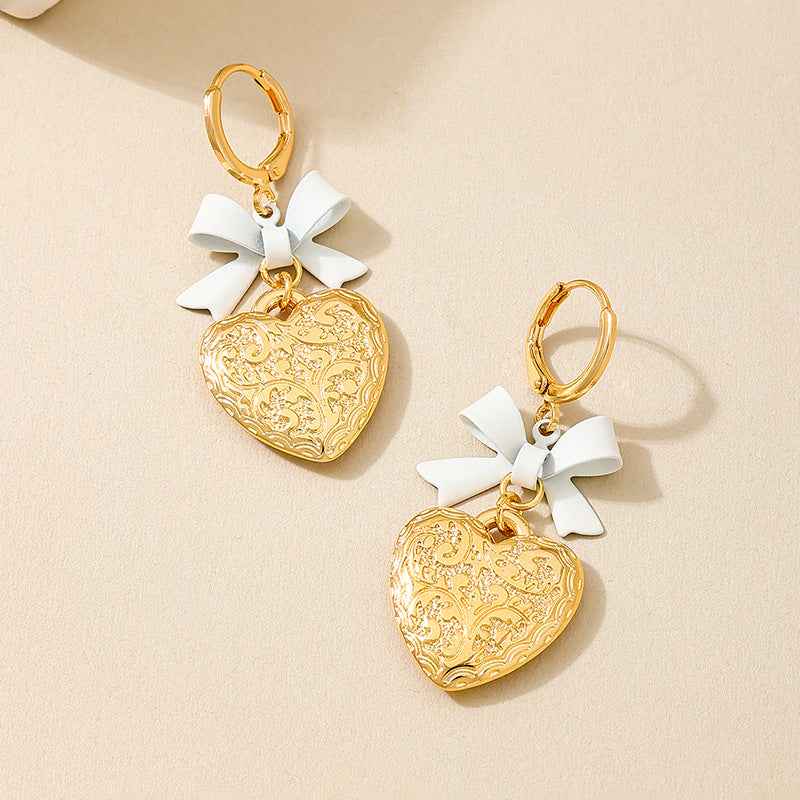 Planderful Vienna Verve Earrings – Elegant Metal Love Bow Design