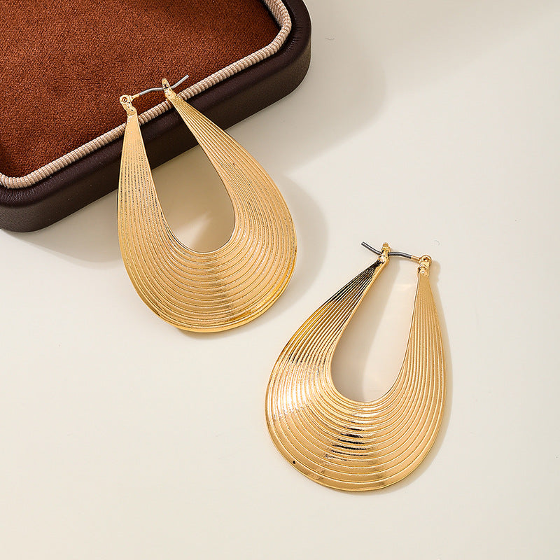 Planderful Vienna Verve Earrings – Exaggerated Metal Hollow Water Drop Design