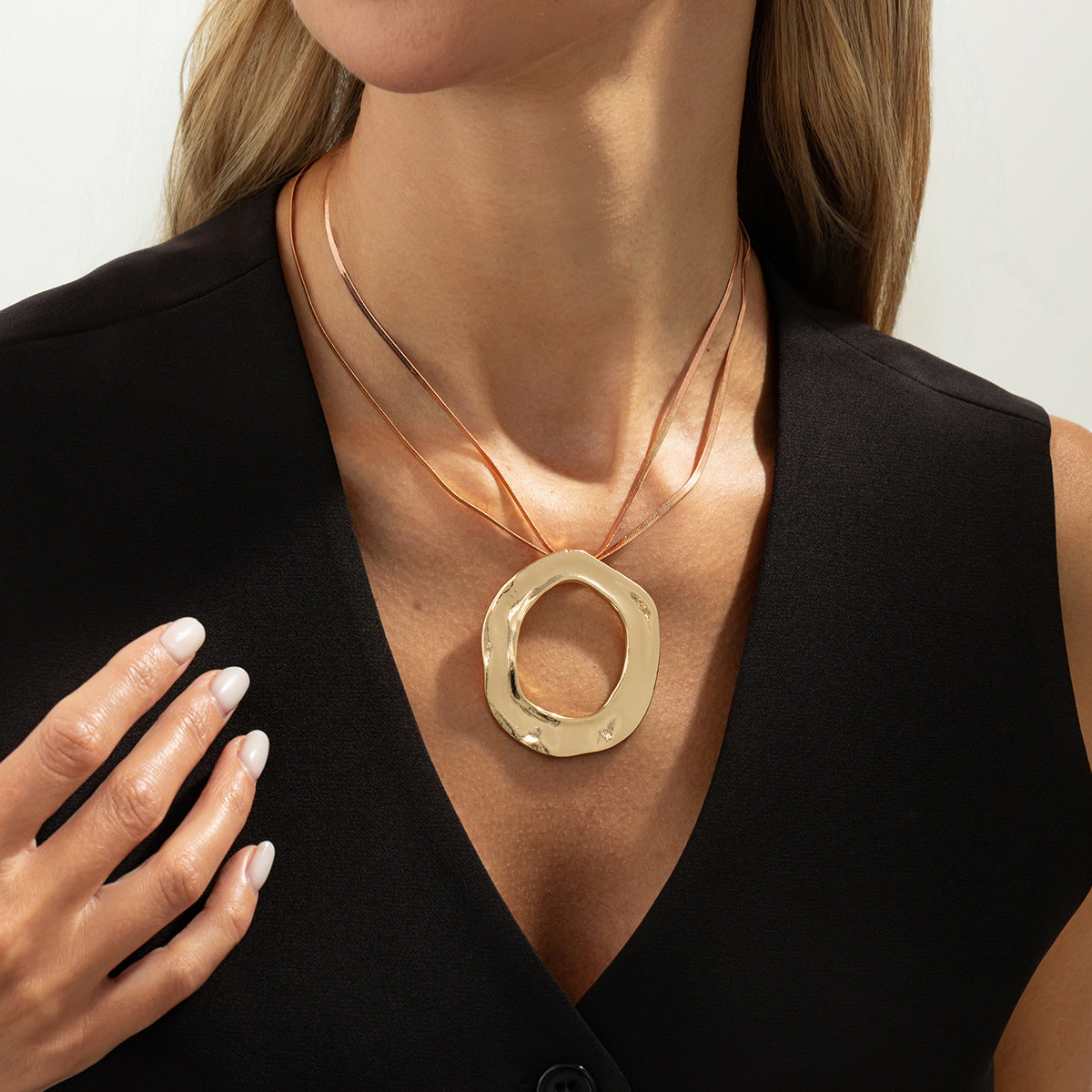 Sculptural Pleated Ring Pendant Necklace