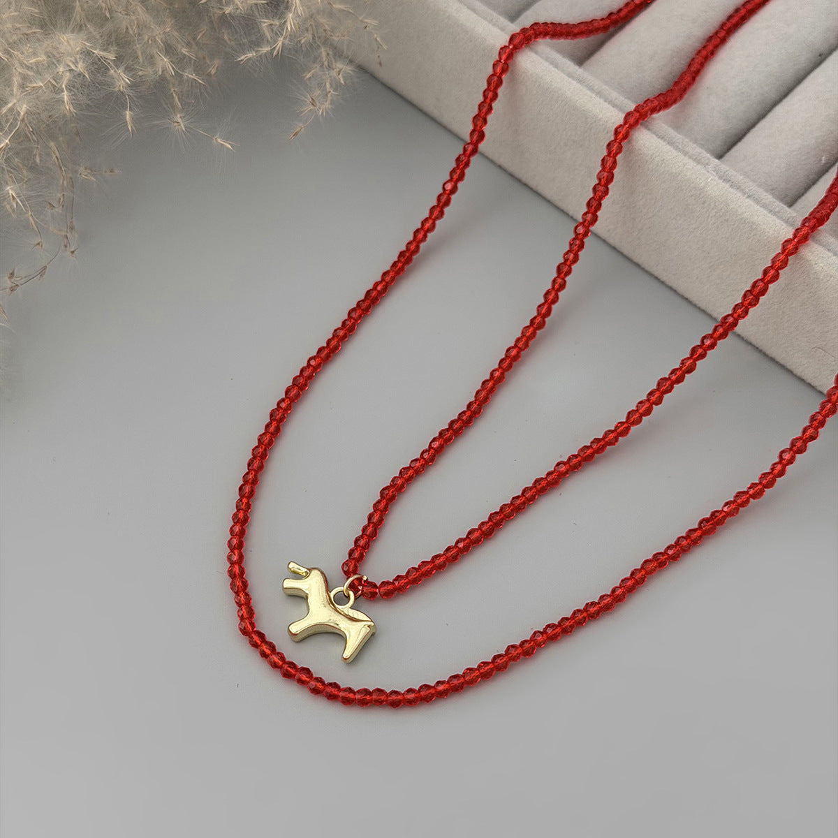 Long Winding Beaded Necklace Pearl Pony Pendant