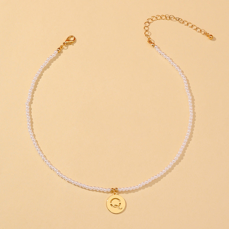 Elegant Hollow English Letter Pendant Necklace with Pearl Accents