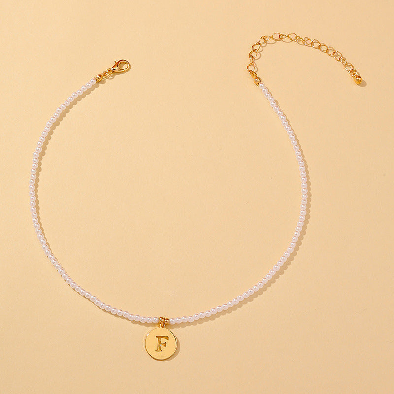 Elegant Hollow English Letter Pendant Necklace with Pearl Accents