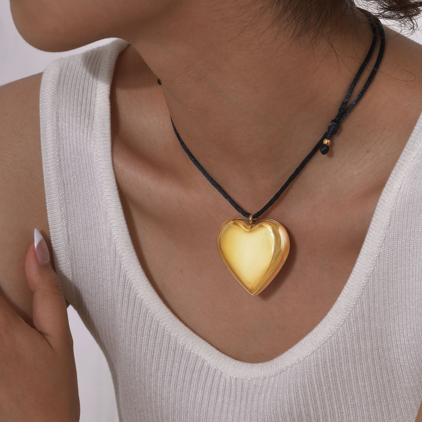 Stainless Steel Hollow Water Drop Heart Pendant Braided Rope Adjustable Necklace