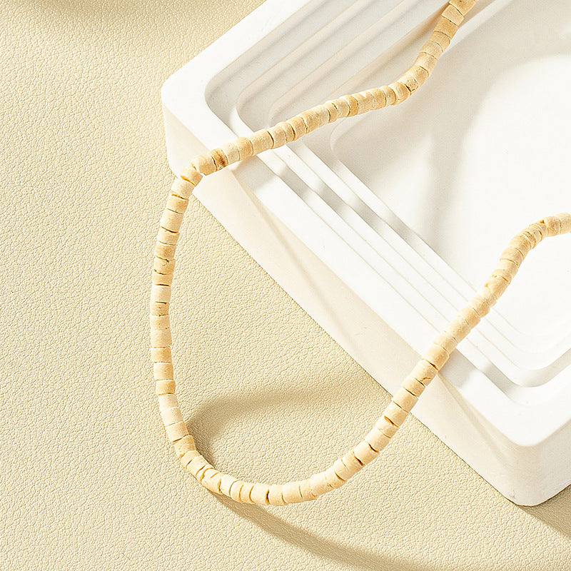 Cold Elegance: Vienna Verve Metal Necklace with Unique Coconut Shell Design