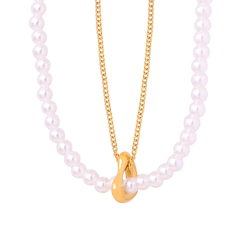 Elegant Handcrafted Pearl Necklace with Retro Charm and Gold Plating
