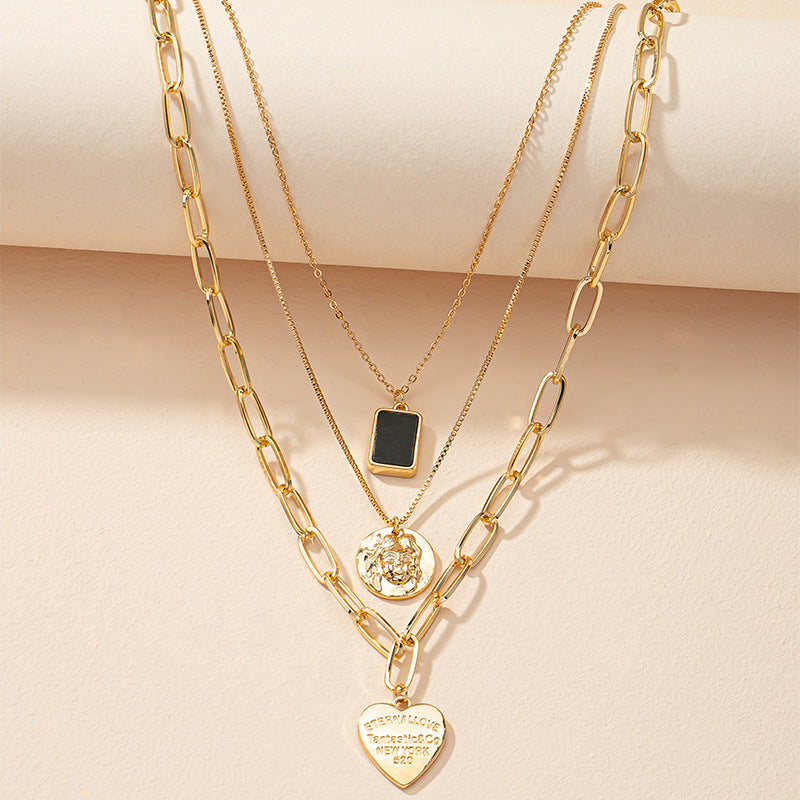 Golden Heart Pendant Collarbone Necklace with Luxe Layered Design