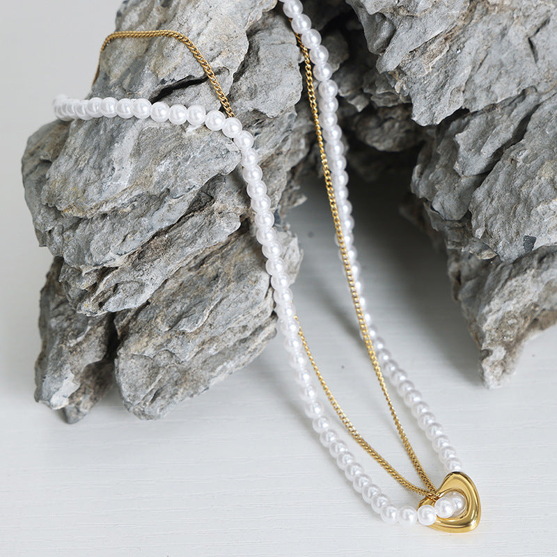 Elegant Handcrafted Pearl Necklace with Retro Charm and Gold Plating