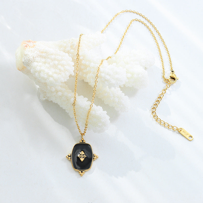 Golden Geometric Pendant Necklace with Oil Dripping Detail