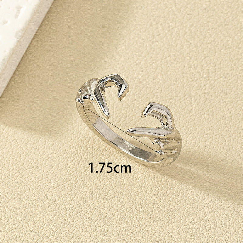 Vienna Verve: Chic Love Gesture Ring and Elegant Fashion Earrings Collection