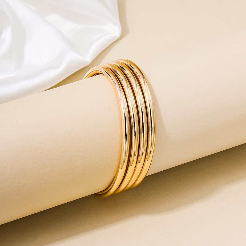 Cross-border Elegance: Vienna Verve Metal Coil Bracelet Set