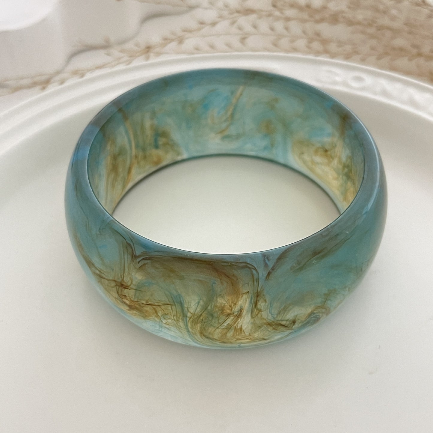 Planderful Vienna Verve Translucent Acrylic Wide Bracelet For Women With Irregular Round Statement Design