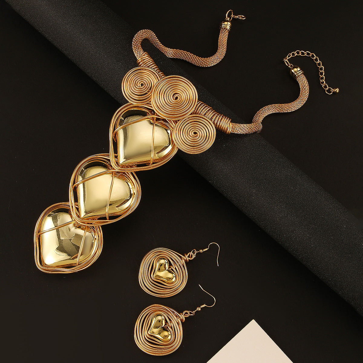 Planderful Savanna Rhythms Necklace and Earrings Set – Exaggerated Three-Dimensional Love Shape Design