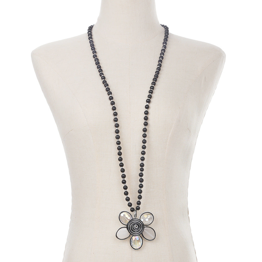 Planderful Savanna Rhythms Necklace – Handmade Glass Bead Flower Pendant