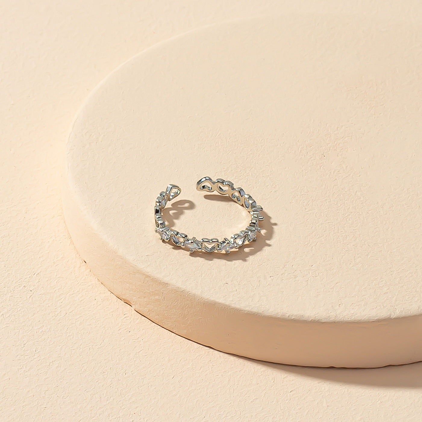 Heartfelt Elegance: Contemporary Heart Opening Ring with a Twist