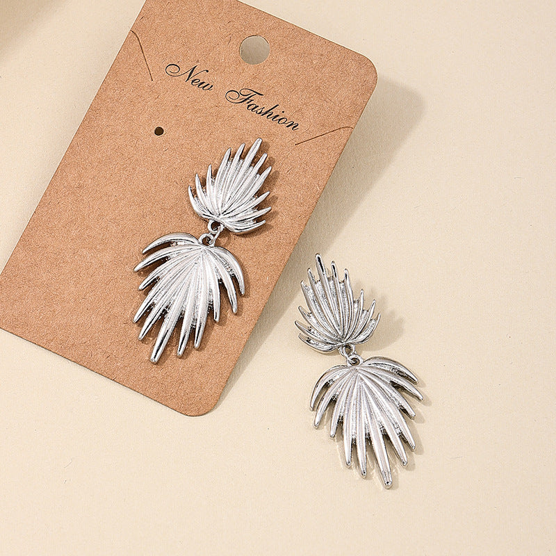 Exaggerated Fan-Shaped Tassel Earrings with Retro Maple Leaf Design