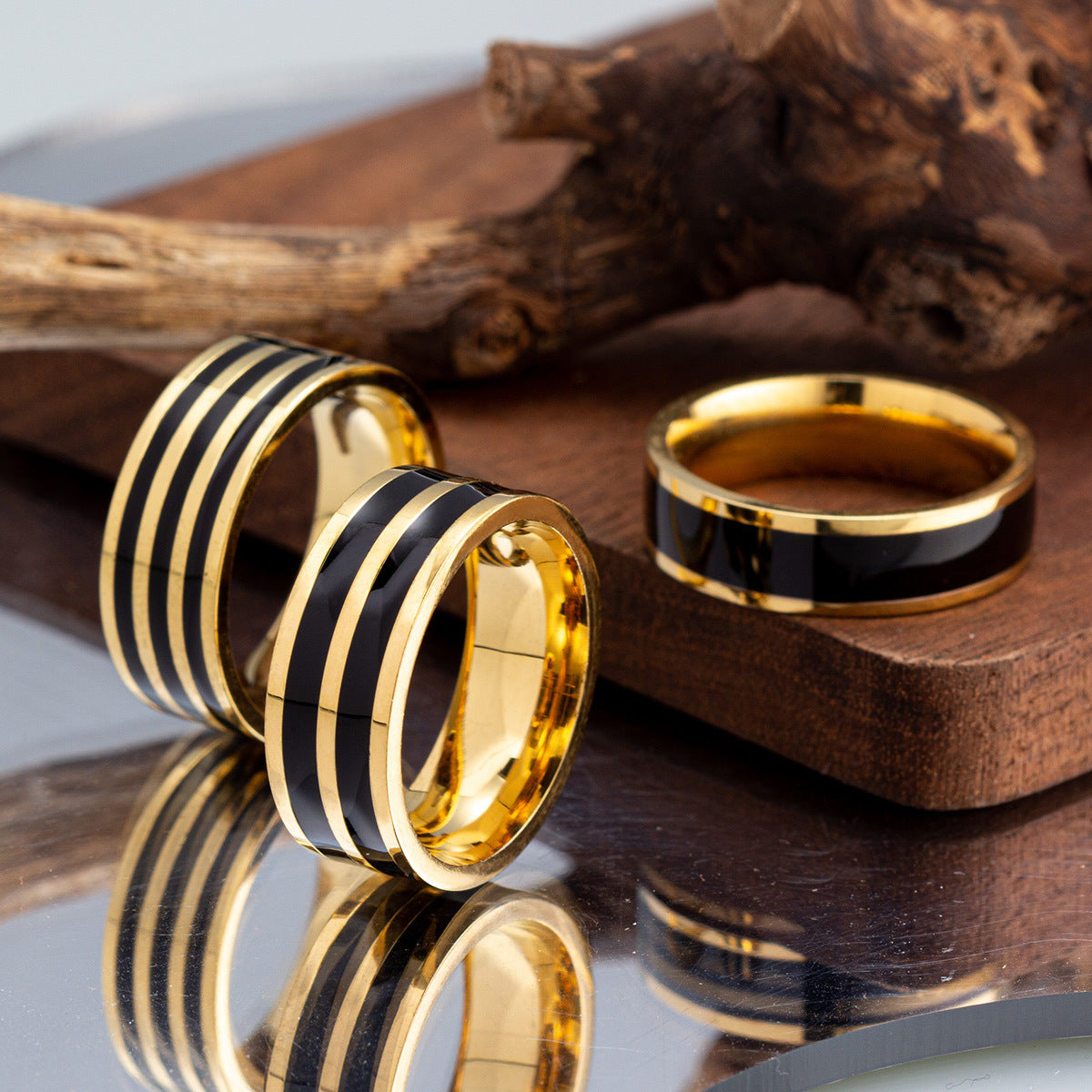 Elegant Titanium and Steel Lover's Ring with Gold-Plated Finish