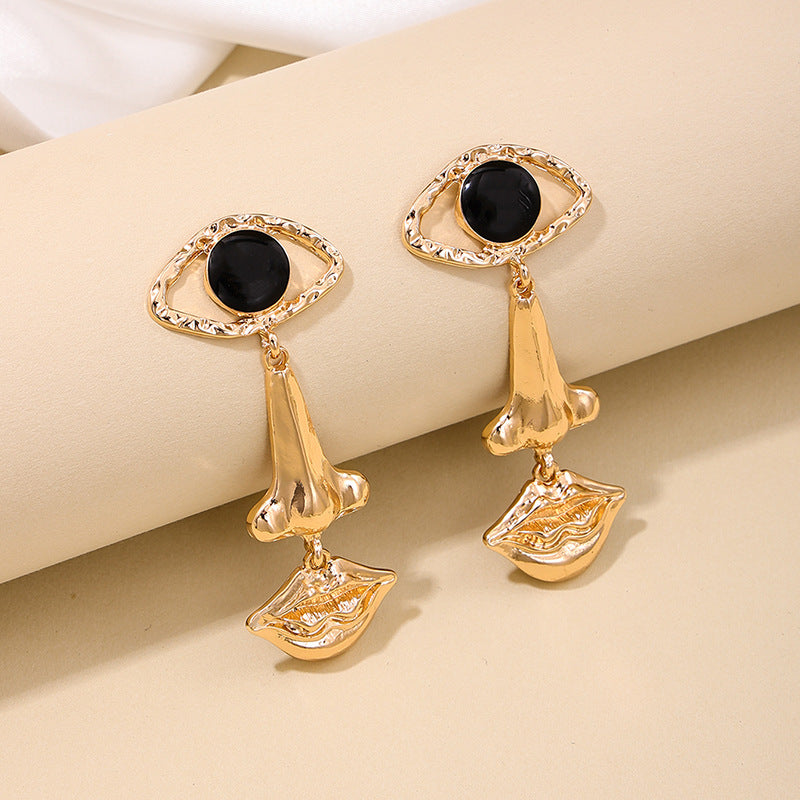 Trendy Devil's Eye Lips Tassel Earrings - Planderful Vienna Verve Collection
