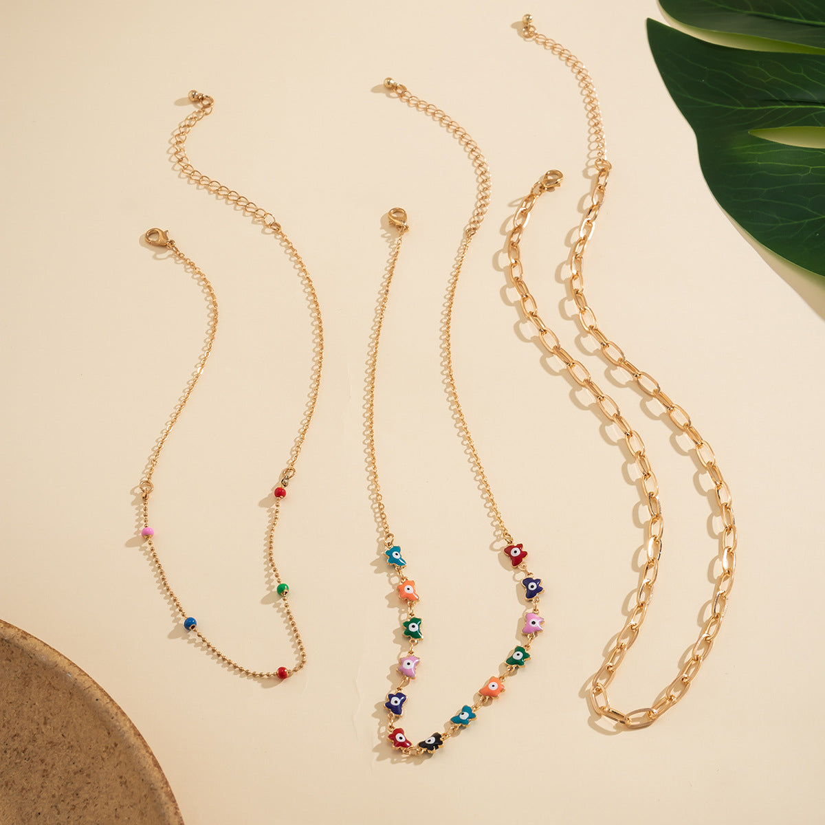 Colorful Oil Dropping Butterfly Eyes Necklace with Cross Pendant and Collar Chain for Women in Europe and America