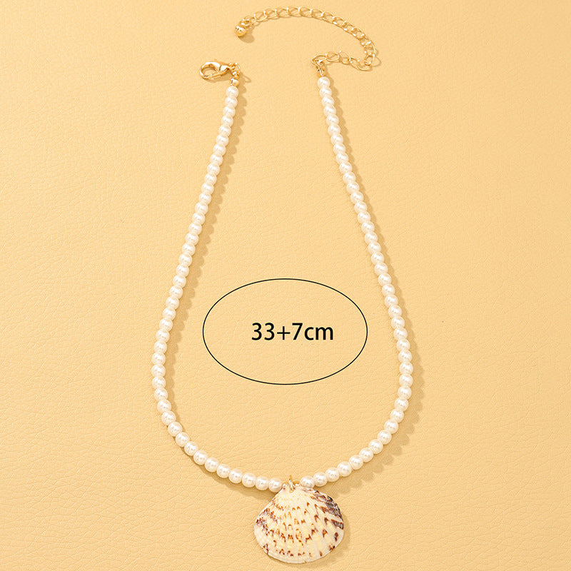 Chic Minimalist Pearl Necklace with Seashell Pendant - Elegant Holiday Style Collar