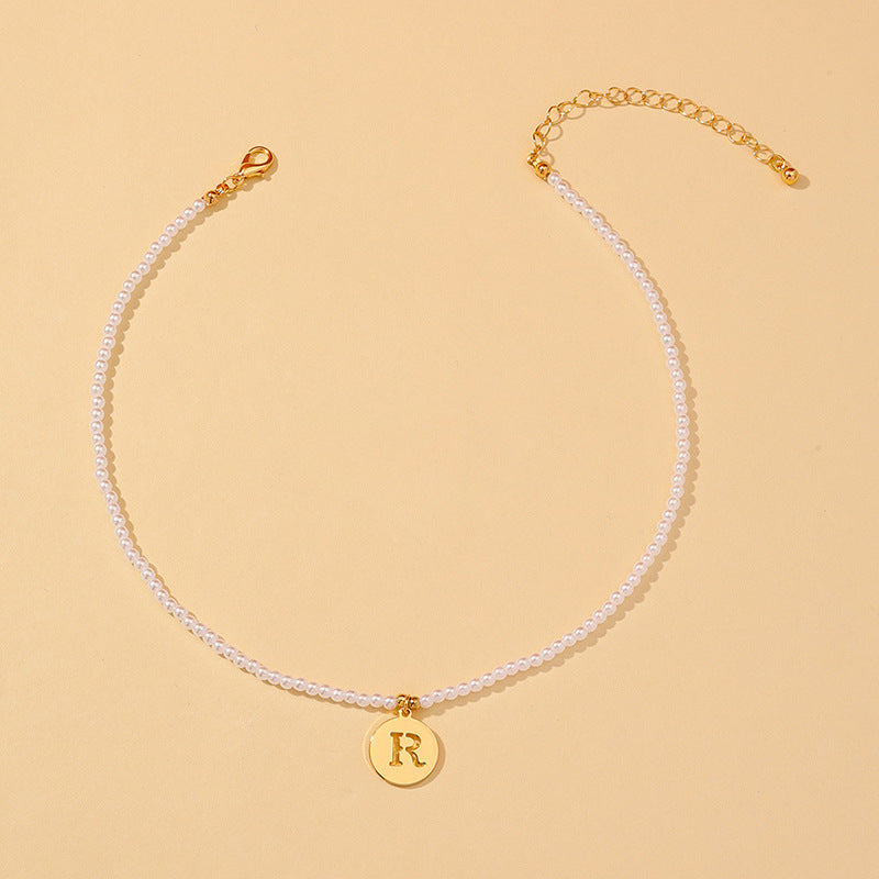 Elegant Hollow English Letter Pendant Necklace with Pearl Accents