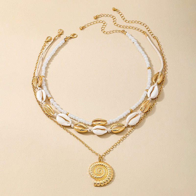 Planderful Vienna Verve Necklace – Beachy Chic Metal Conch Shell Design