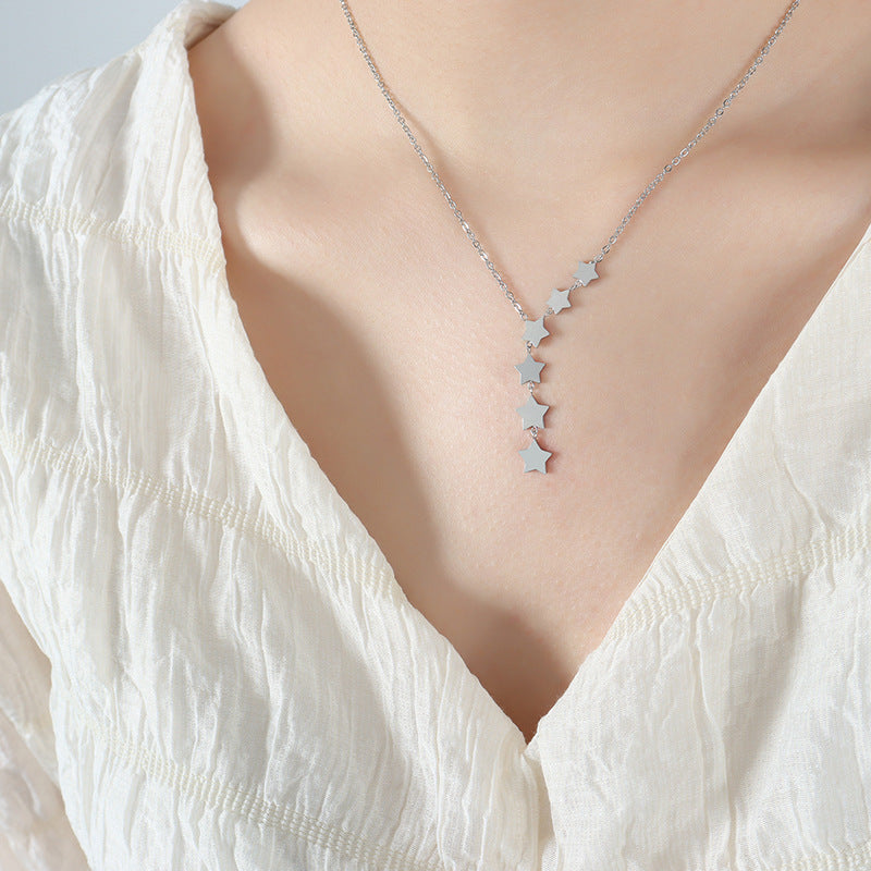 Whimsical Star Tassel Necklace with Fairy Charm