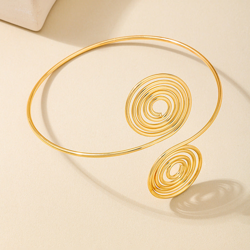 Golden Spiral Arm Ring for Women by Planderful Fashion Statement