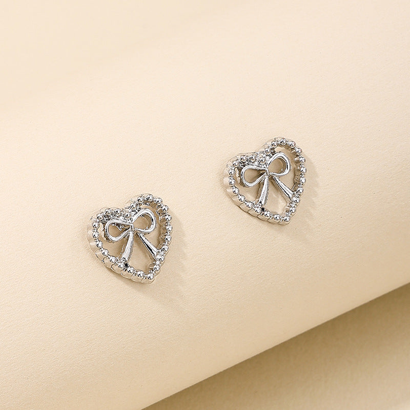 Chic Hollow Love Bow Earrings - Vienna Verve Collection