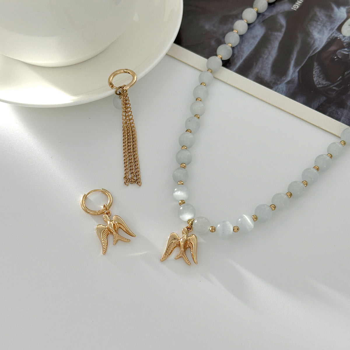 Planderful Vienna Verve Cat Eye Beaded Jewelry Set For Women Fringed Ear Buckle Earrings And Swallow Pendant Necklace