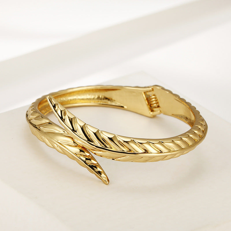 Golden Leaf Woven Bracelet - Exquisite Handcrafted Jewelry - Vienna Verve Collection