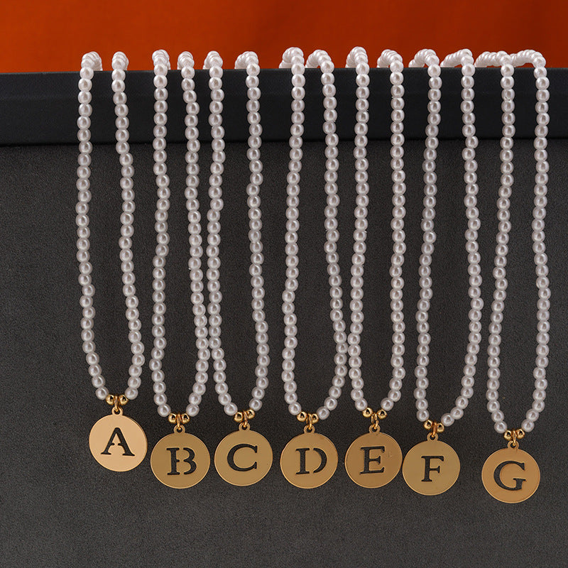 Elegant Hollow English Letter Pendant Necklace with Pearl Accents