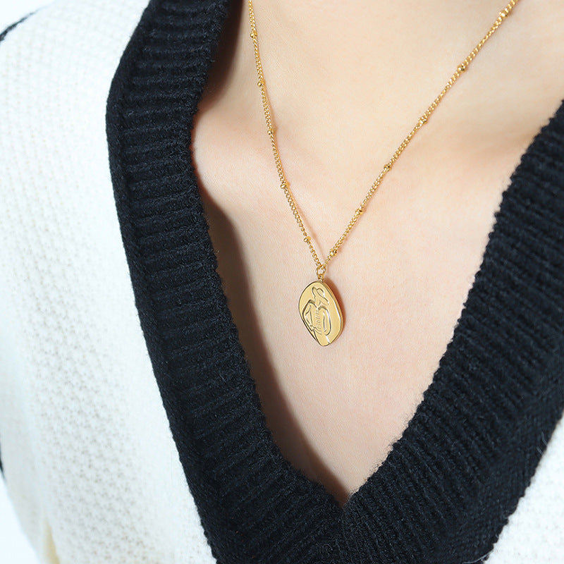 Golden Embossed Portrait Pendant Necklace - Stylish Titanium Steel Chain