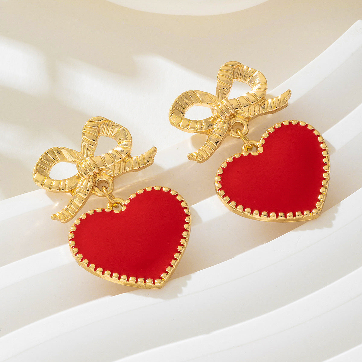 Planderful Vienna Verve Earrings – Stylish Metal Bow Design for Valentine's Day