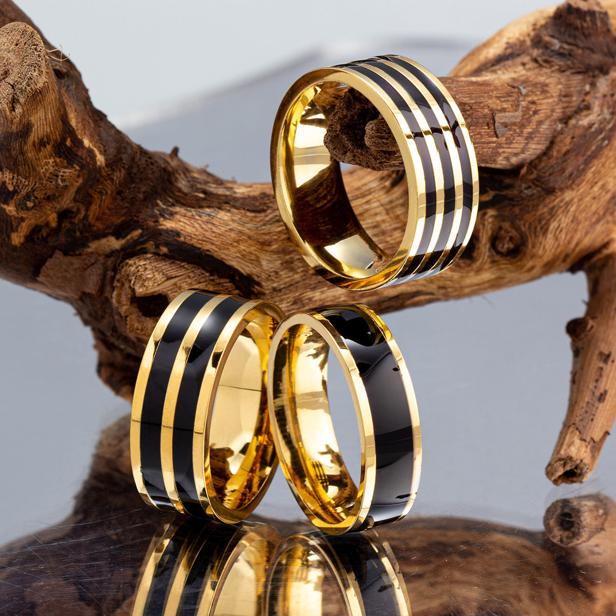 Elegant Titanium and Steel Lover's Ring with Gold-Plated Finish