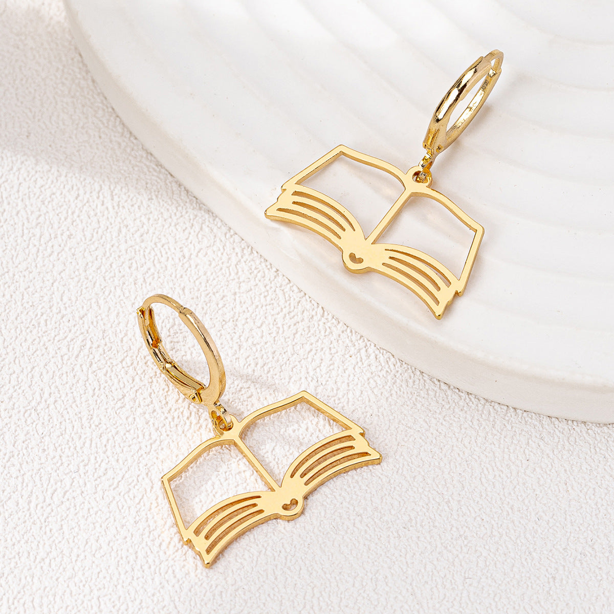 Planderful Vienna Verve Earrings – Stylish Hollow Book Design