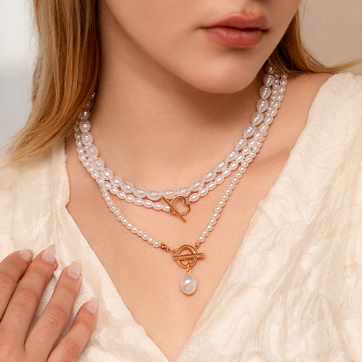 Multi-Layer Pearl and Diamond Heart Necklace with European Flair