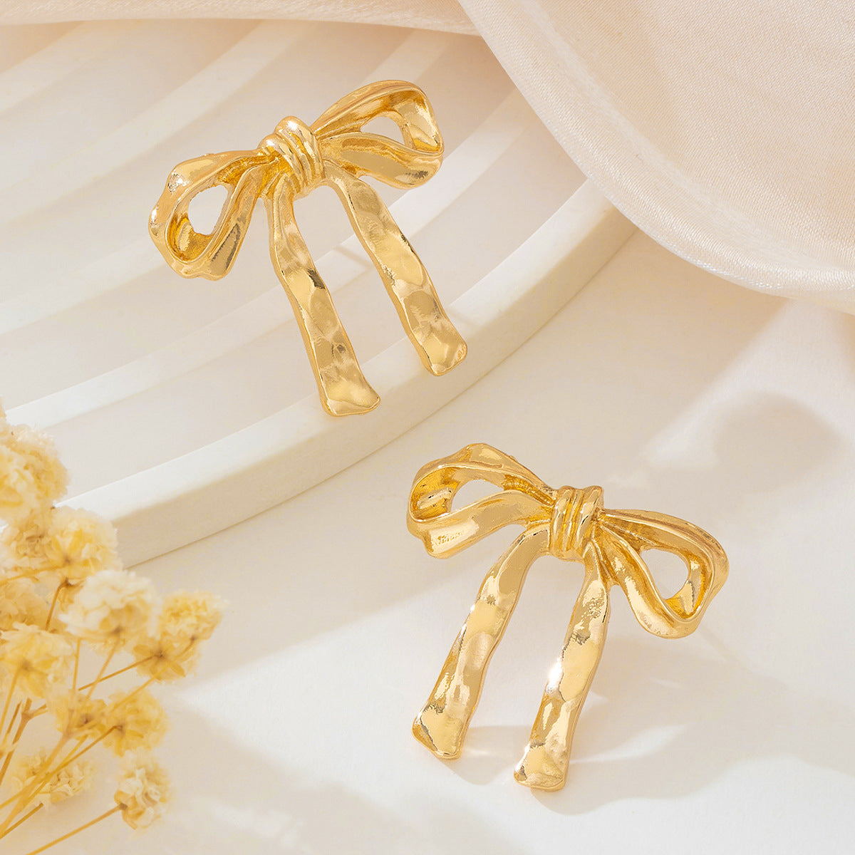 Planderful Vienna Verve Earrings – Exquisite Metal French Bow Design