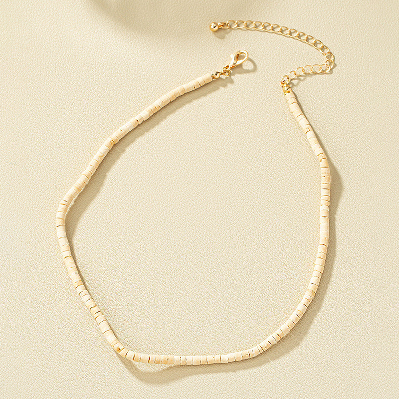 Cold Elegance: Vienna Verve Metal Necklace with Unique Coconut Shell Design