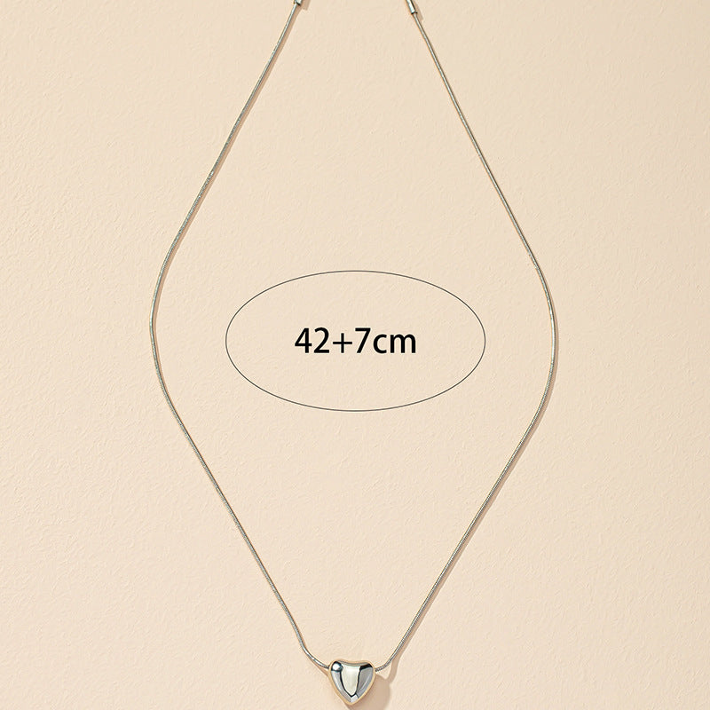 Exquisite Vienna Verve Heart Chain Necklace - Metal Jewelry Piece from Planderful Collection