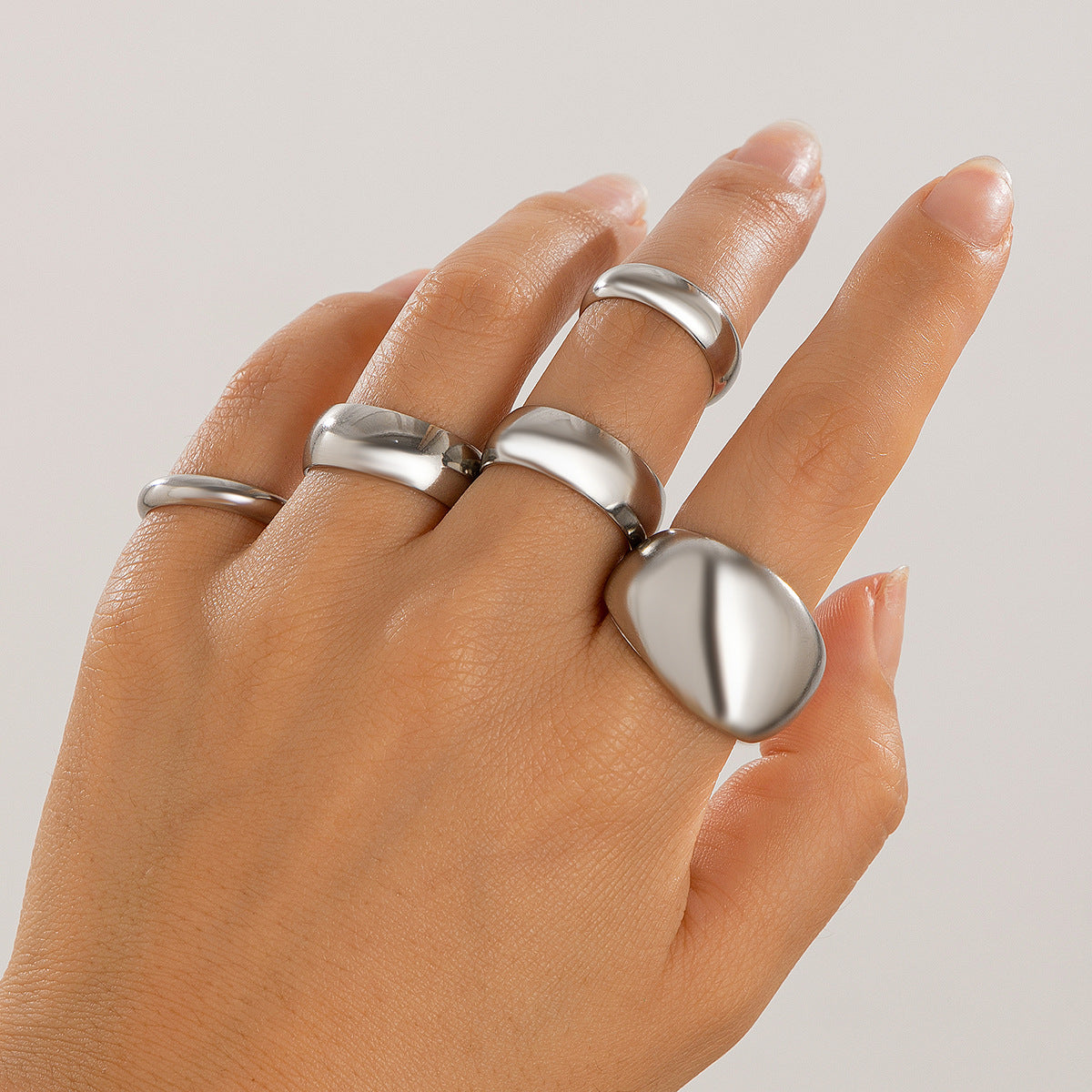 Planderful Vienna Verve Geometric Metal Ring For Fashion Forward Adults With Irregular Lava Texture