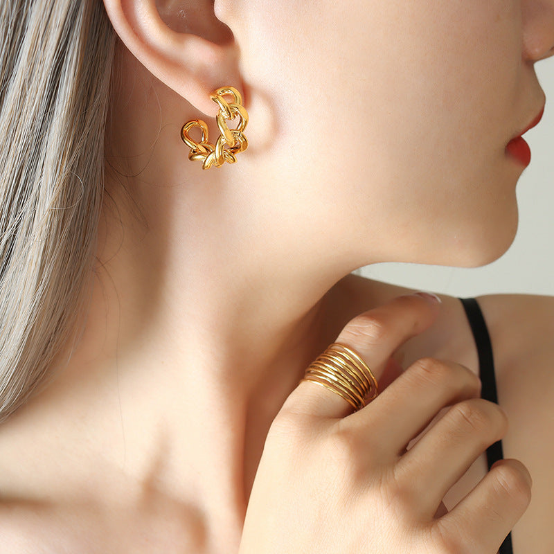 Cold Wind Twist Hollow C-Shaped Gold Earrings - Trendy European Style