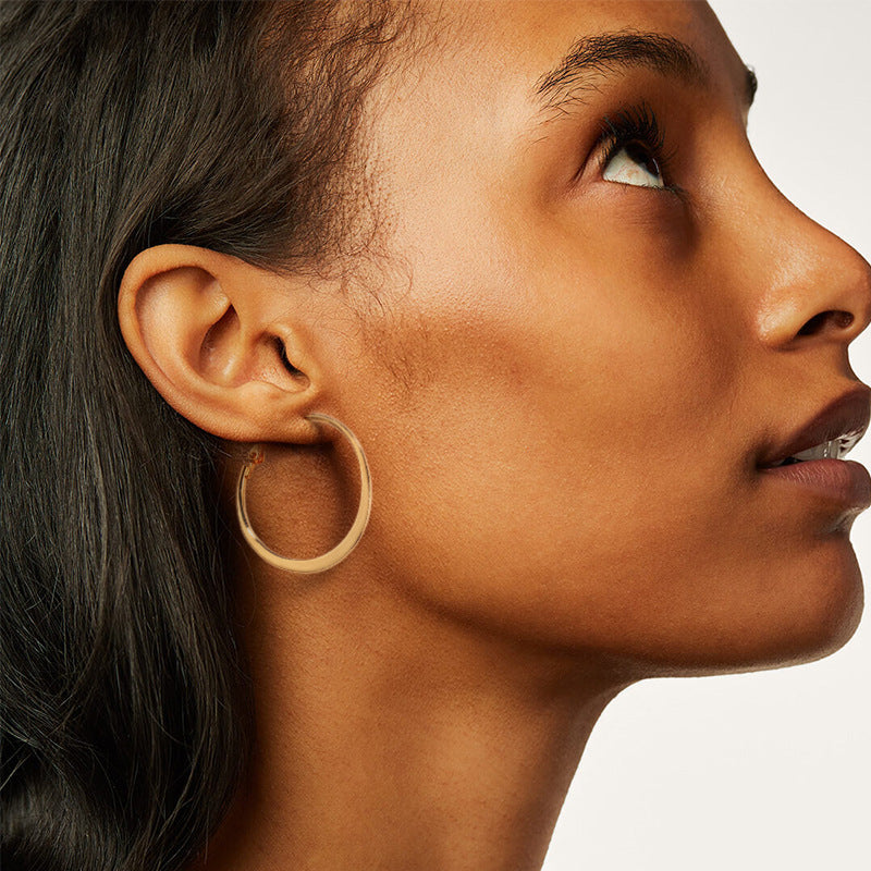 Gold-Tone Curved Metal Hoop Earrings