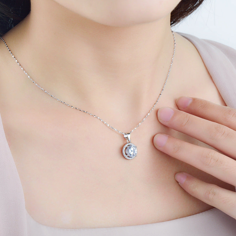 Circular Sterling Silver Pendant Necklace with Zircon Gem